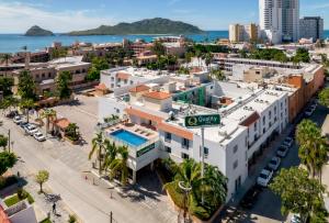 an overhead view of a city with a street sign at Quality Inn Mazatlan in Mazatlán