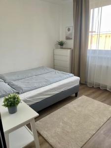 Postel nebo postele na pokoji v ubytování Moderní apartmán v srdci Jablonce