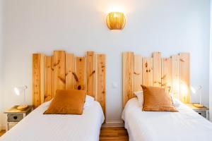 Postel nebo postele na pokoji v ubytování Hotel Joly