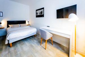 Postel nebo postele na pokoji v ubytování Hotel Joly