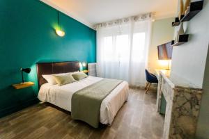 Postel nebo postele na pokoji v ubytování Hotel Joly