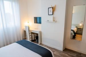 Postel nebo postele na pokoji v ubytování Hotel Joly