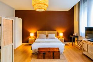 Postel nebo postele na pokoji v ubytování Hotel Joly