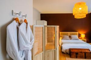 Postel nebo postele na pokoji v ubytování Hotel Joly