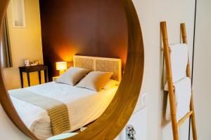 Postel nebo postele na pokoji v ubytování Hotel Joly