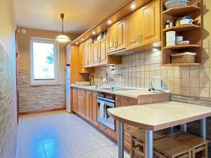 Køkken eller tekøkken på Duży Dom nad Morzem Rowy Jarzębinowa 22