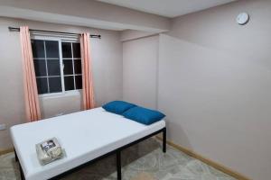 Postel nebo postele na pokoji v ubytování Olivia's Island Serenity Apt1
