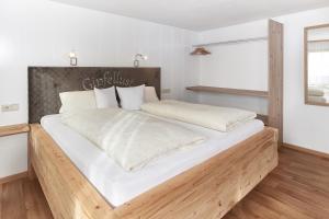 Postel nebo postele na pokoji v ubytování Pension Vorberghof- Bauernhofurlaub