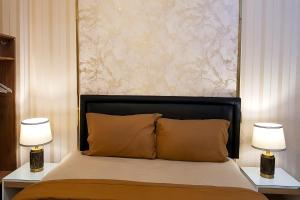 Ένα ή περισσότερα κρεβάτια σε δωμάτιο στο Luci Dream Benson Apartment at Supermal Pakuwon +51 φωτογραφίες