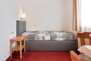Postel nebo postele na pokoji v ubytování Pension Vorberghof- Bauernhofurlaub