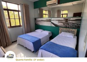 Postel nebo postele na pokoji v ubytování Rey House