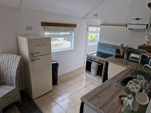 Nhà bếp/bếp nhỏ tại Trenant Cottage