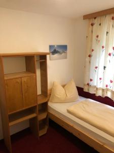 Postel nebo postele na pokoji v ubytování Haus Steissbach