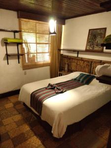 Postel nebo postele na pokoji v ubytování Hotel Casa Chapultepec