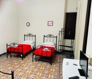 Letto o letti in una camera di Maya Palace Real Rooms Palermo centre close to Cathedral