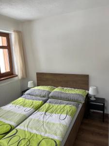 Postel nebo postele na pokoji v ubytování Chalupa u Josefa