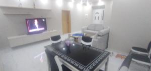 TV a/nebo společenská místnost v ubytování Guest house YMERI