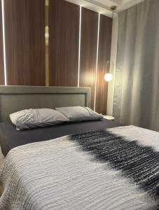 Ein Bett oder Betten in einem Zimmer der Unterkunft La Vela Luxury