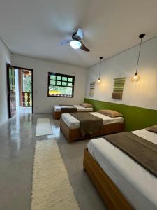 Postel nebo postele na pokoji v ubytování TuriHouse