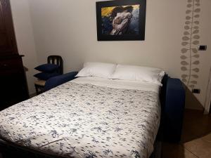 Postel nebo postele na pokoji v ubytování Ca d Rita