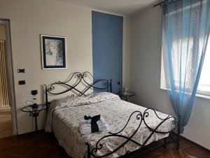 Postel nebo postele na pokoji v ubytování Ca d Rita