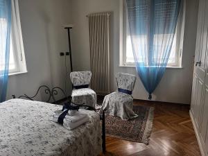 Postel nebo postele na pokoji v ubytování Ca d Rita