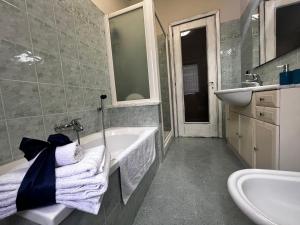 Koupelna v ubytování Ca d Rita + 18 fotografií