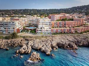 an aerial view of a city with rocks in the water at 3 pièces rénové avec loggia, WIFI et parking à Sète - FR-1-472A-294 in Sète