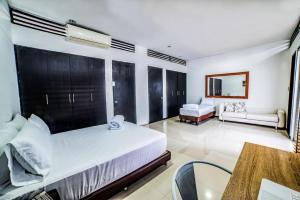 Voodi või voodid majutusasutuse Casa ilana Ciudad Jardin toas