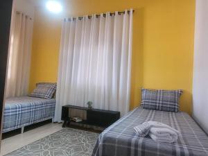 Gallery image of Casa com piscina 4QUARTOS in Belo Horizonte +18 photos