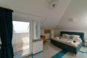 Letto o letti in una camera di Luxury Seaview Villa with Jacuzzi, Sauna & Gym in Amalfi Coast - Villa Dorotea