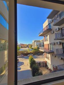 a view of a parking lot from a building at Apartament GabRox in Mamaia Sat/Năvodari