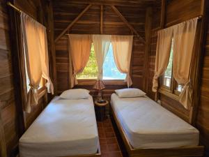 Postel nebo postele na pokoji v ubytování Nueva Tierra
