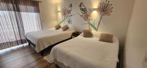Un ou plusieurs lits dans un hébergement de l'établissement HOSTAL LA MODERNA