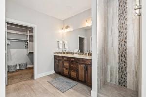 a bathroom with a walk in shower and a sink at Boise Hills Oasis in Boise +35 photos