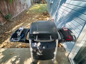 a motorcycle parked on the side of a fence at Sugar Shack in Downtown Meridian in Meridian +15 photos