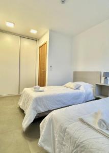 Cama o camas de una habitación en A dos cuadras del Paseo la Galería