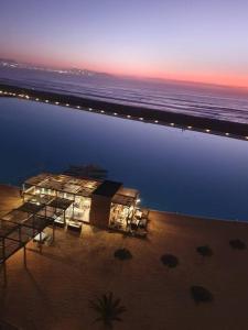 an aerial view of a beach at night at Departamento Laguna del Mar in La Serena