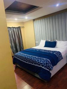 Postel nebo postele na pokoji v ubytování Dee service apartment