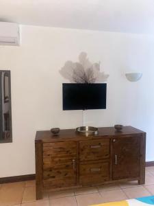 TV a/nebo společenská místnost v ubytování Secret Garden