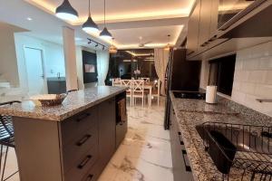 Kuchyň nebo kuchyňský kout v ubytování La Soñada casa quinta Premium