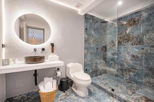 Koupelna v ubytování Nago Hometel Boutique + 22 fotografií