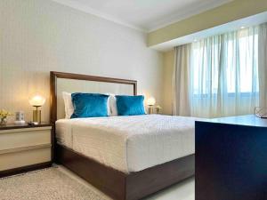 Cama ou camas em um quarto em Upscale Centric Apt Near All