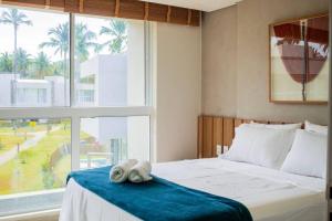 Postel nebo postele na pokoji v ubytování Casa Corais Milagres + 56 fotografií