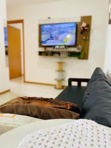 Televisyen dan/atau pusat hiburan di Hospedagem Praia Word Penha SC
