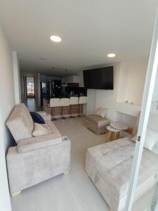 Posezení v ubytování apartamento vista al lago