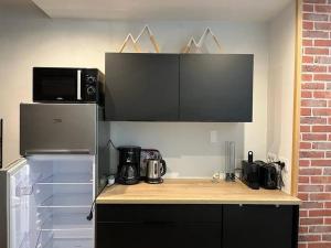 Una cocina o zona de cocina en Appartement avec vue imprenable et tout le confort
