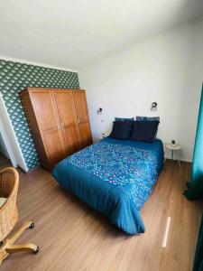 Cama o camas de una habitación en Appartement avec vue imprenable et tout le confort