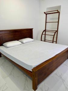 Uma cama ou camas num quarto em Havelock City Hostel, Colombo