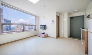 TV a/nebo společenská místnost v ubytování POL-A Resort Haeundae